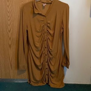 A light brown tight dress